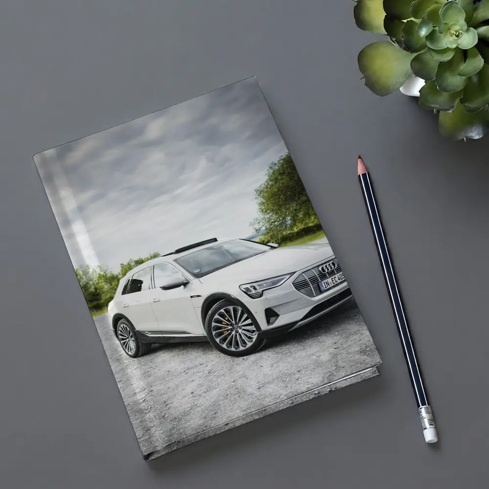 Audi E-Tron White SUV Cloudy Outdoor Setting – Notebooks