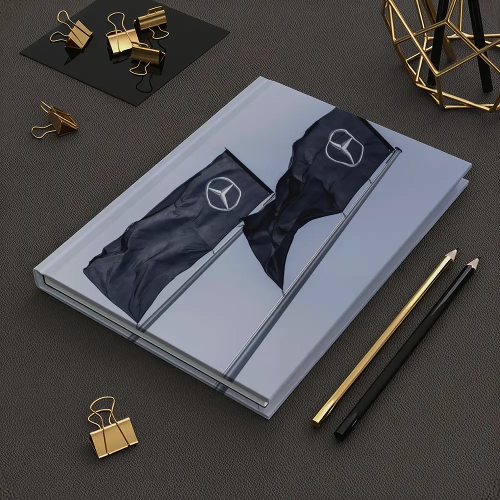 Mercedes Benz Flags Against Gray Sky – Notebooks