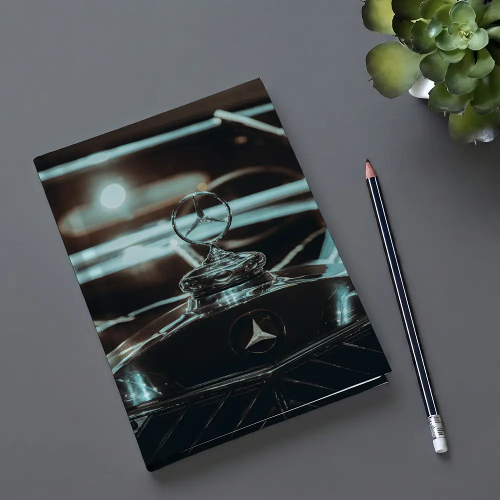 Mercedes Classic Hood Ornament Dark Background – Notebooks