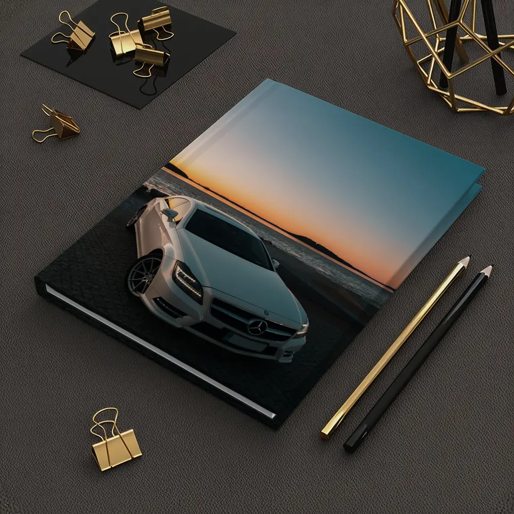 White Mercedes CLS Parked by Sunset Shore – Notebooks