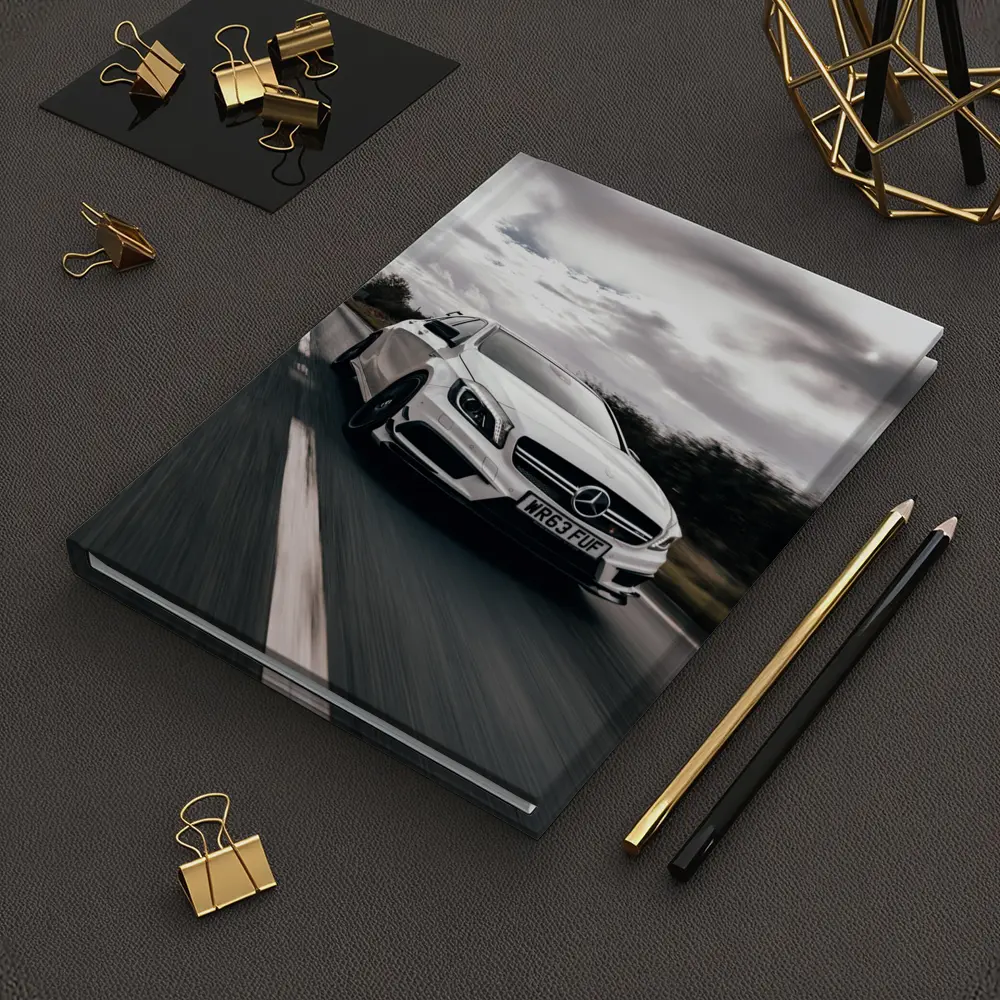 Mercedes AMG White Hatchback On Open Road – Notebooks