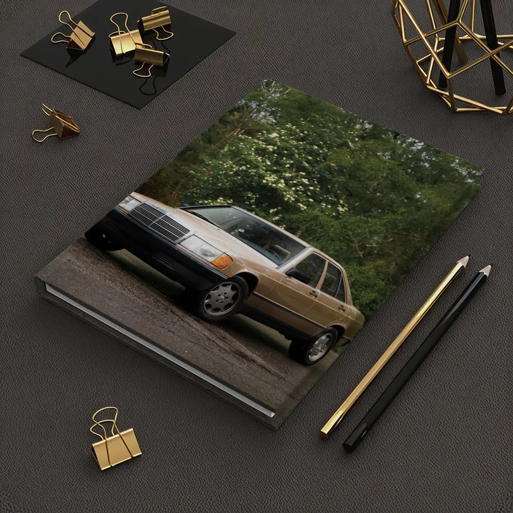 Mercedes 190E Classic Sedan Lush Green Background – Notebooks