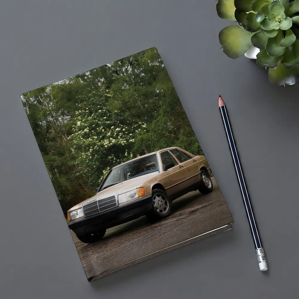 Mercedes 190E Classic Sedan Lush Green Background – Notebooks