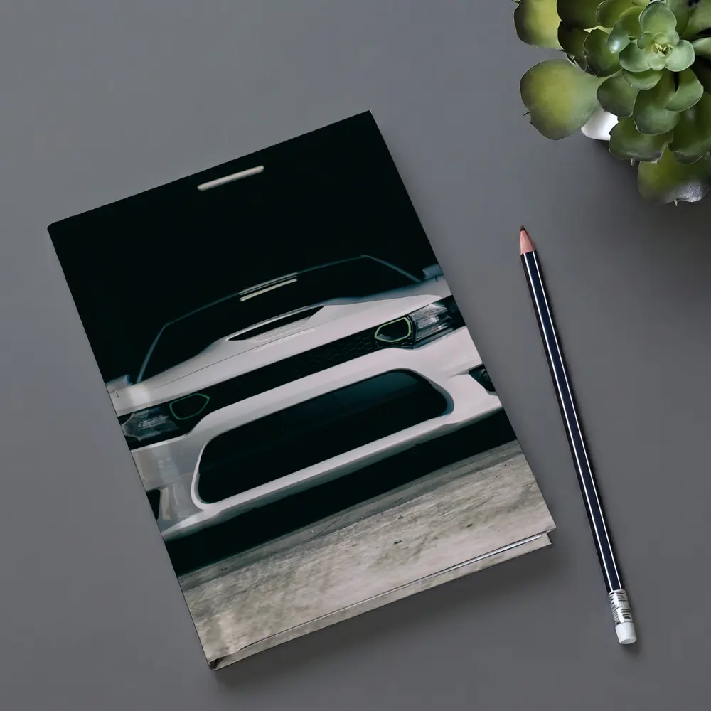 White Dodge Charger Front View Dark Garage – Notebooks