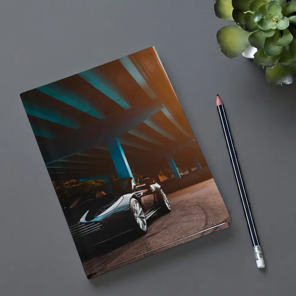 Aston Martin DB11 Under Urban Bridge Sunset – Notebooks