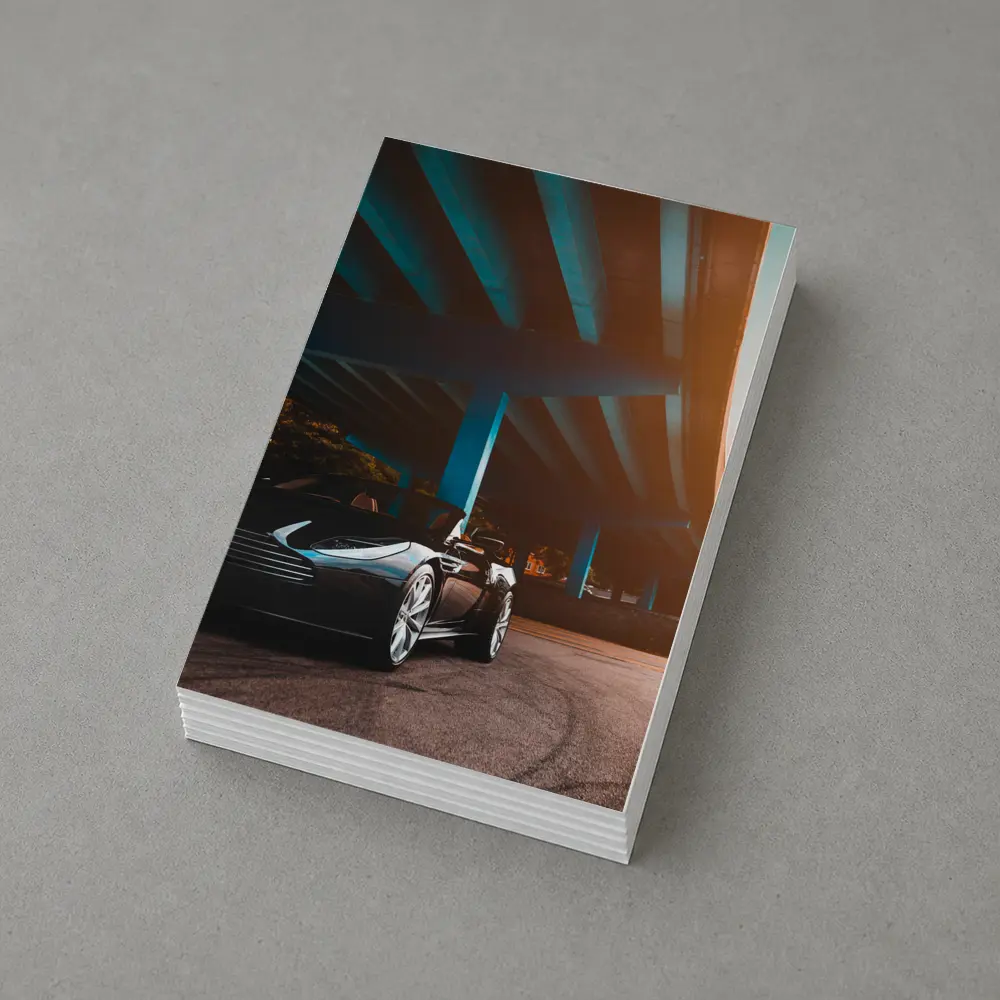 Aston Martin DB11 Under Urban Bridge Sunset – Postcards
