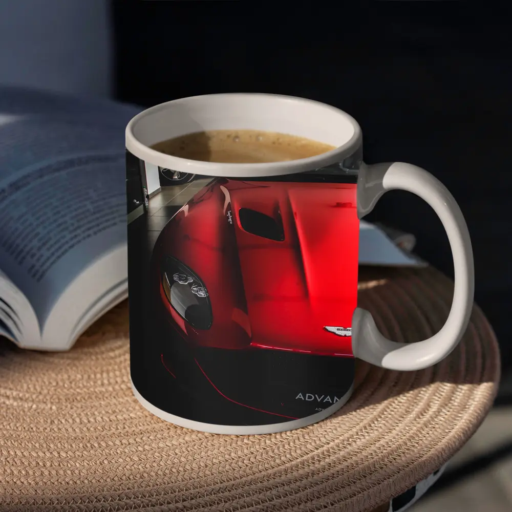 Red Aston Martin Vanquish Inside Dealership Showroom – Mugs