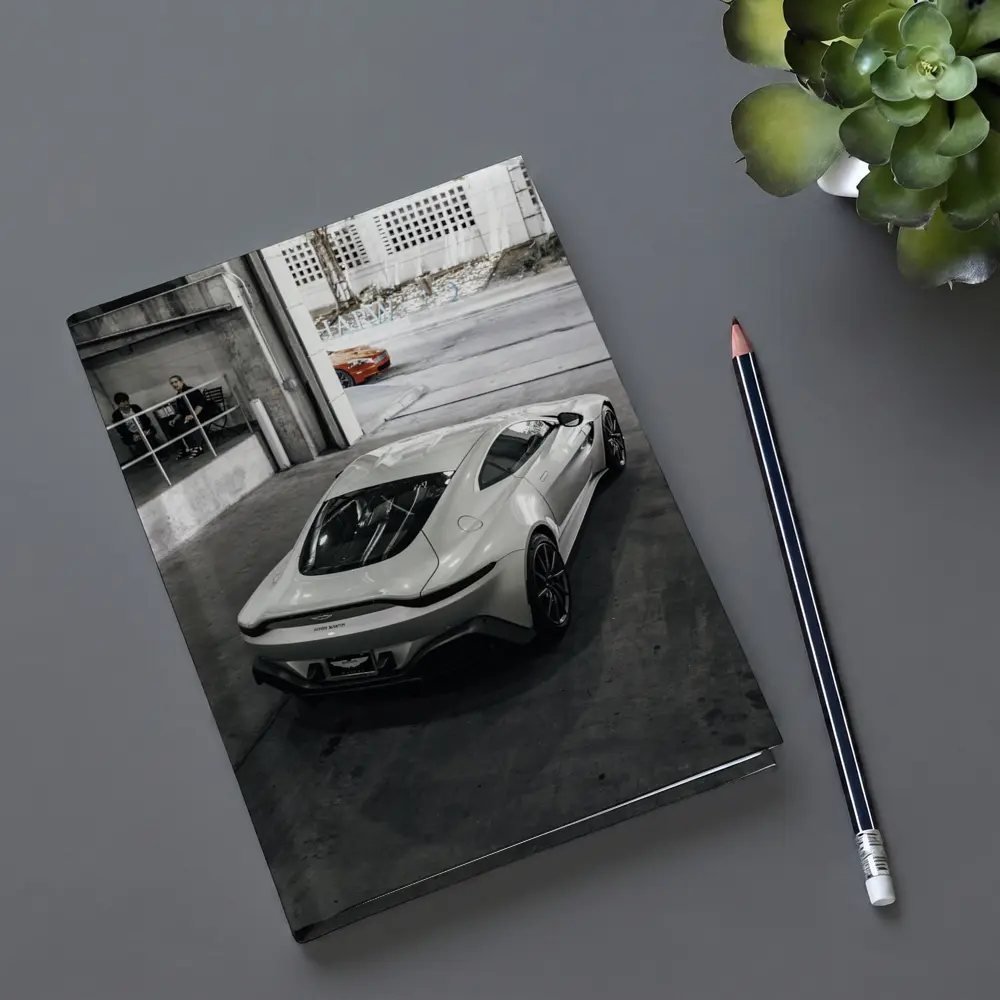 Aston Martin Vantage White Parked Urban Garage – Notebooks