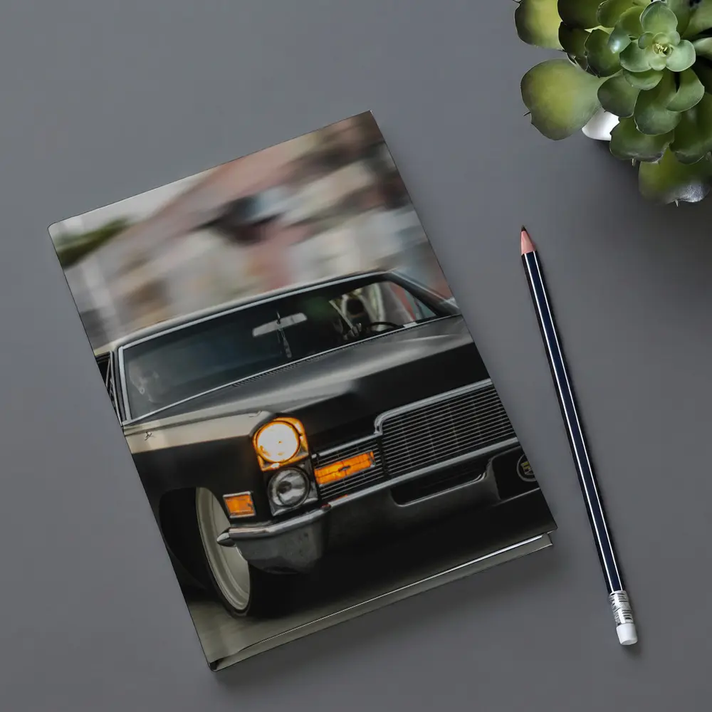Black Cadillac Lowrider Cruising City Streets – Notebooks