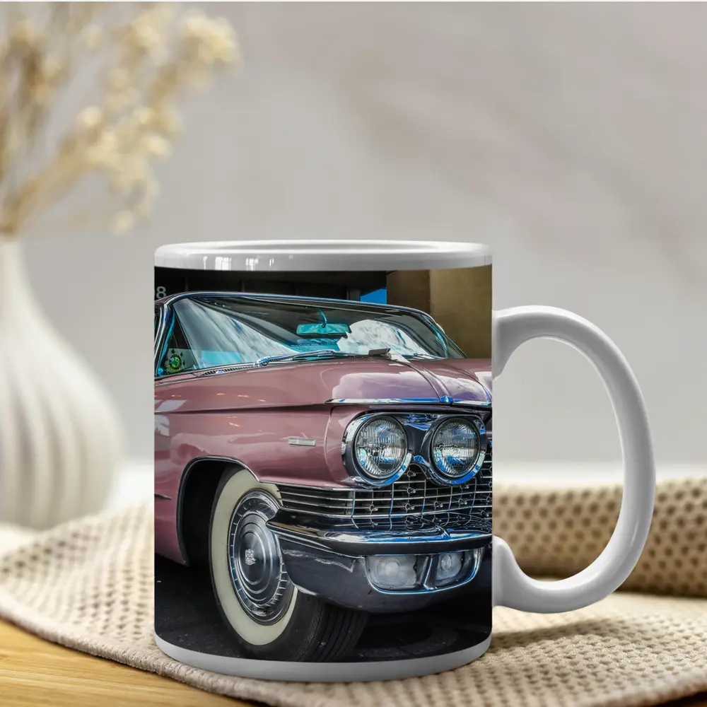 Classic Pink Cadillac Parked Outside Building – Mugs