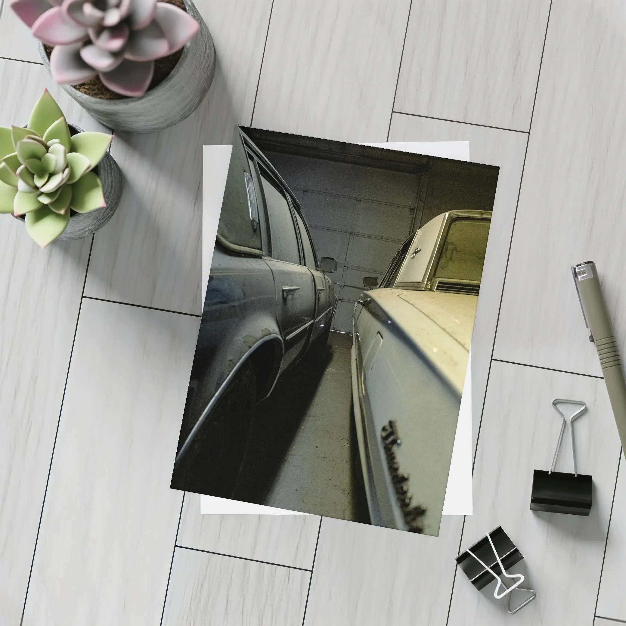 Two Classic Cars Parked Inside Dark Garage – Postcards