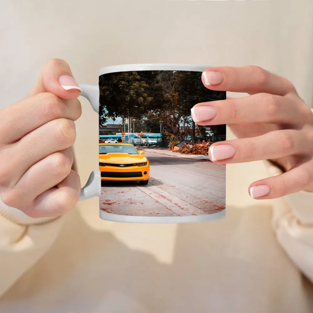 Yellow Chevrolet Camaro on Urban Street – Mugs
