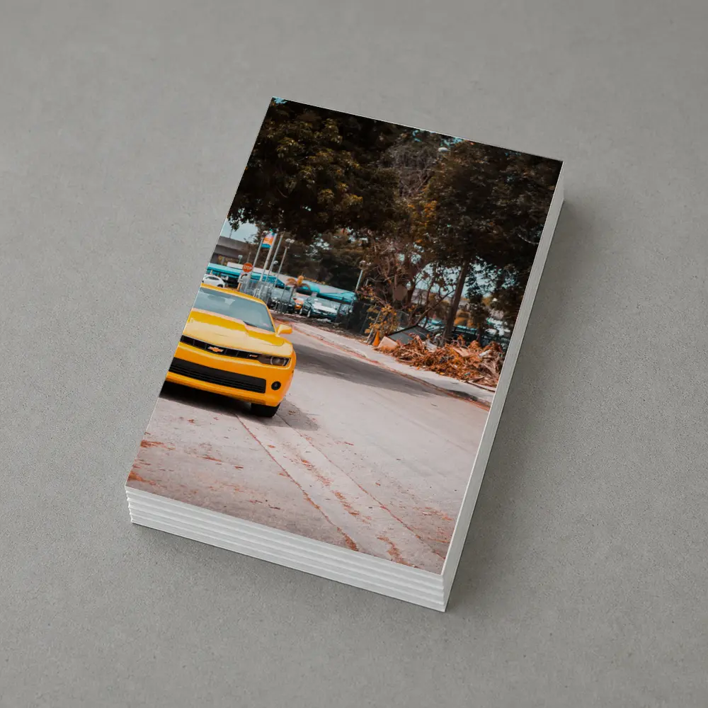 Yellow Chevrolet Camaro on Urban Street – Postcards