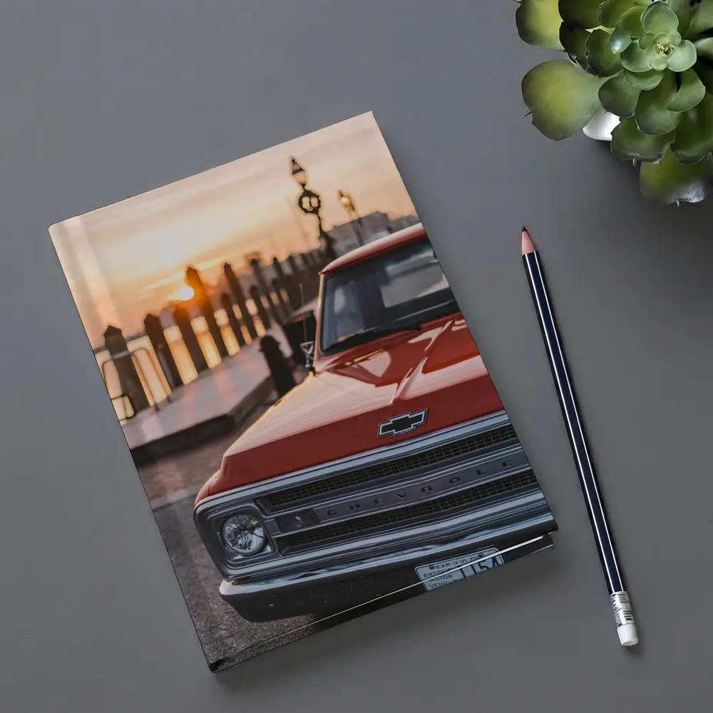 Chevrolet Classic Truck Sunset Harbor View – Notebooks