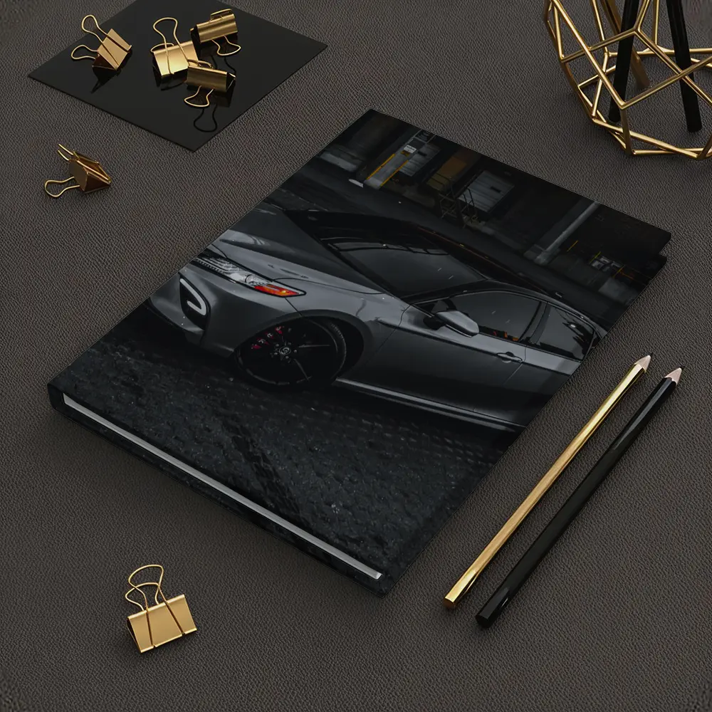 Toyota Camry Silver Sedan Dark Urban Setting – Notebooks
