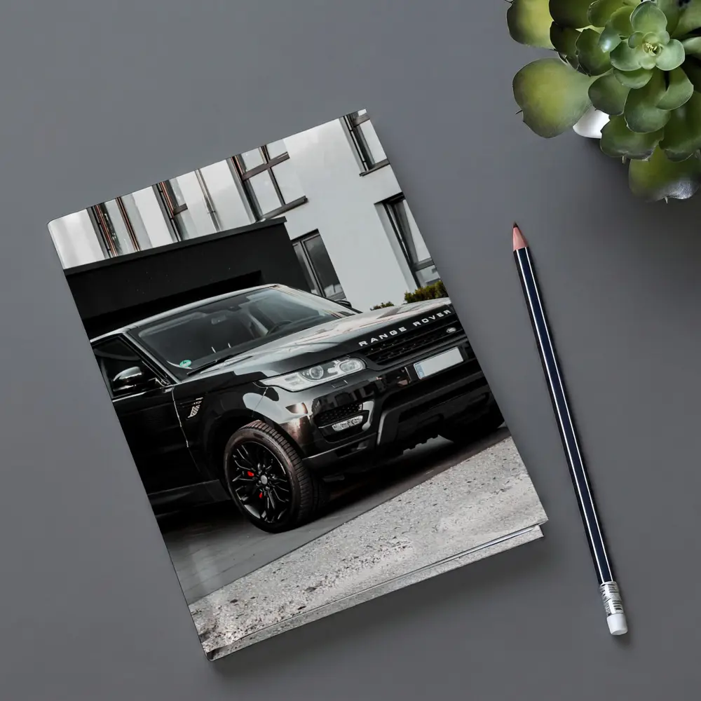 Black Range Rover Sport Parked Outside House – Notebooks