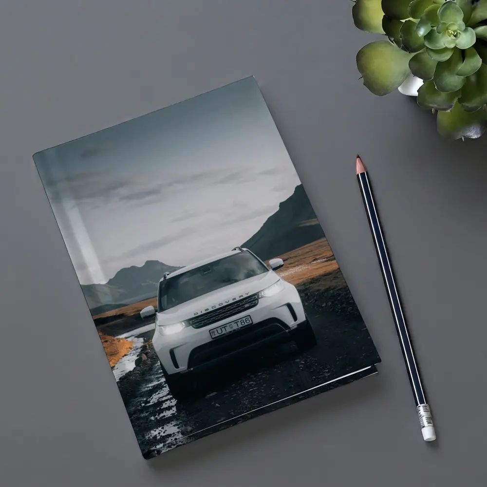 Land Rover Discovery on Rugged Mountain Road – Notebooks