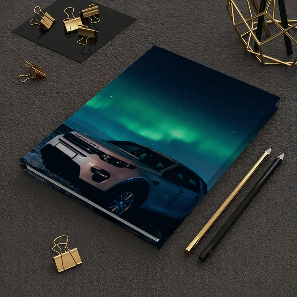 Land Rover Discovery Under Northern Lights Sky – Notebooks