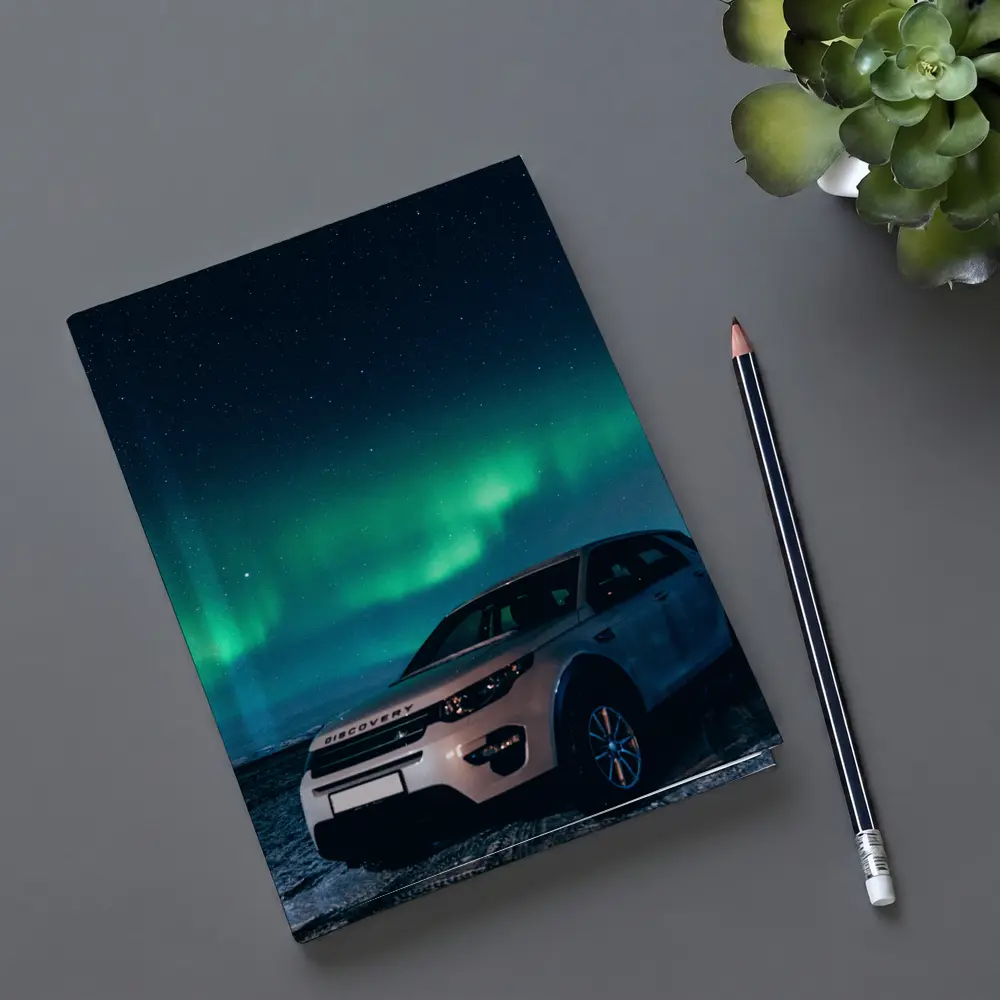 Land Rover Discovery Under Northern Lights Sky – Notebooks