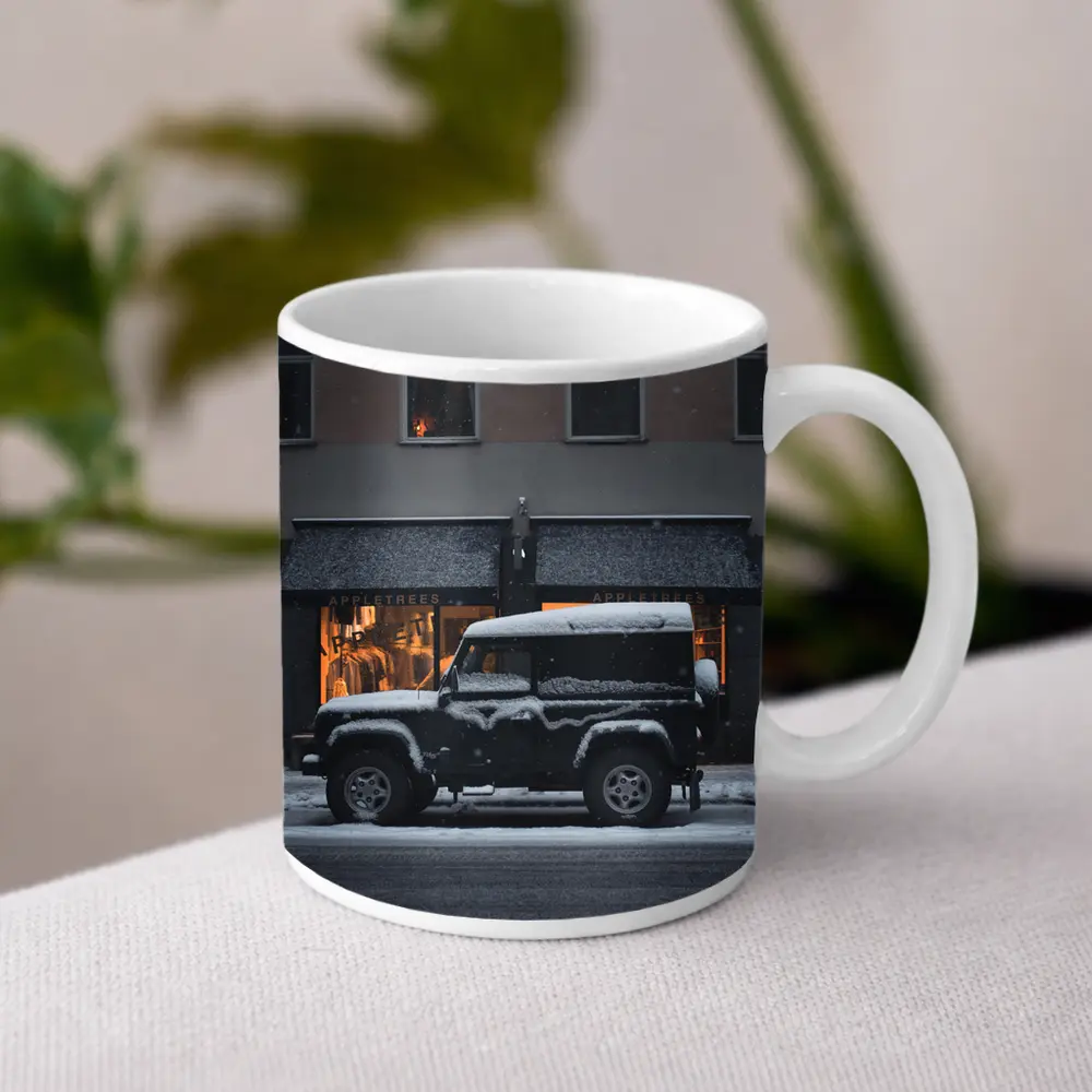 Land Rover Defender Snow Covered City Street – Mugs