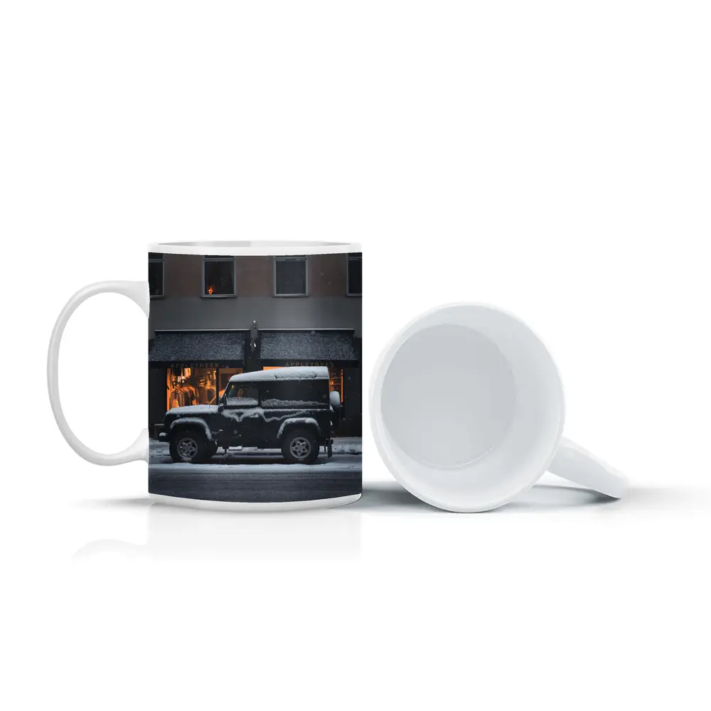 Land Rover Defender Snow Covered City Street – Mugs
