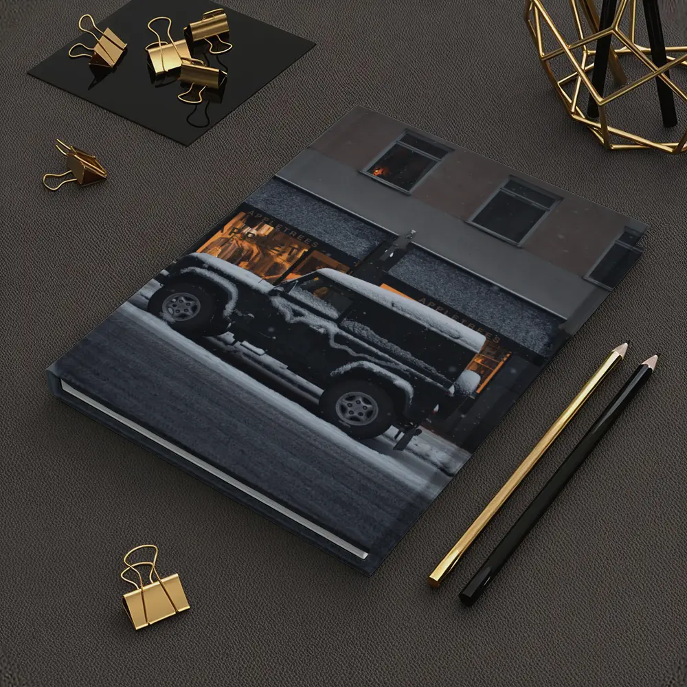Land Rover Defender Snow Covered City Street – Notebooks