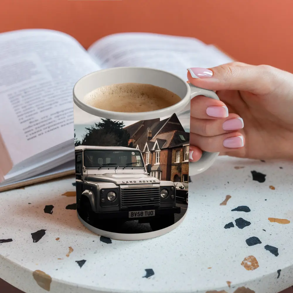 Land Rover Defender Parked English Village Street – Mugs