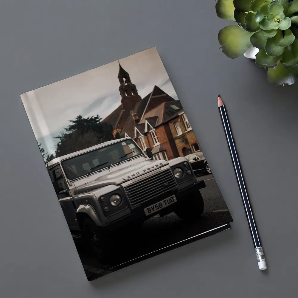 Land Rover Defender Parked English Village Street – Notebooks