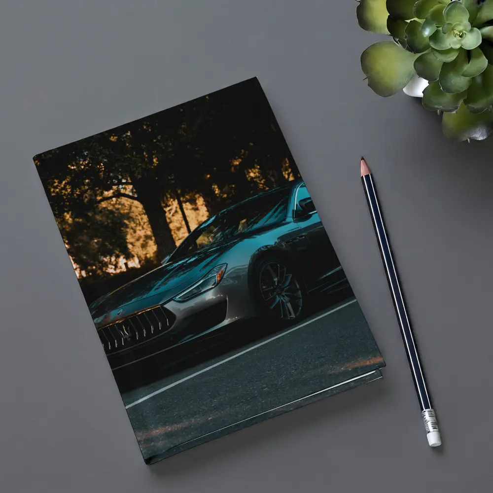 Maserati Ghibli Parked Under Evening Trees – Notebooks