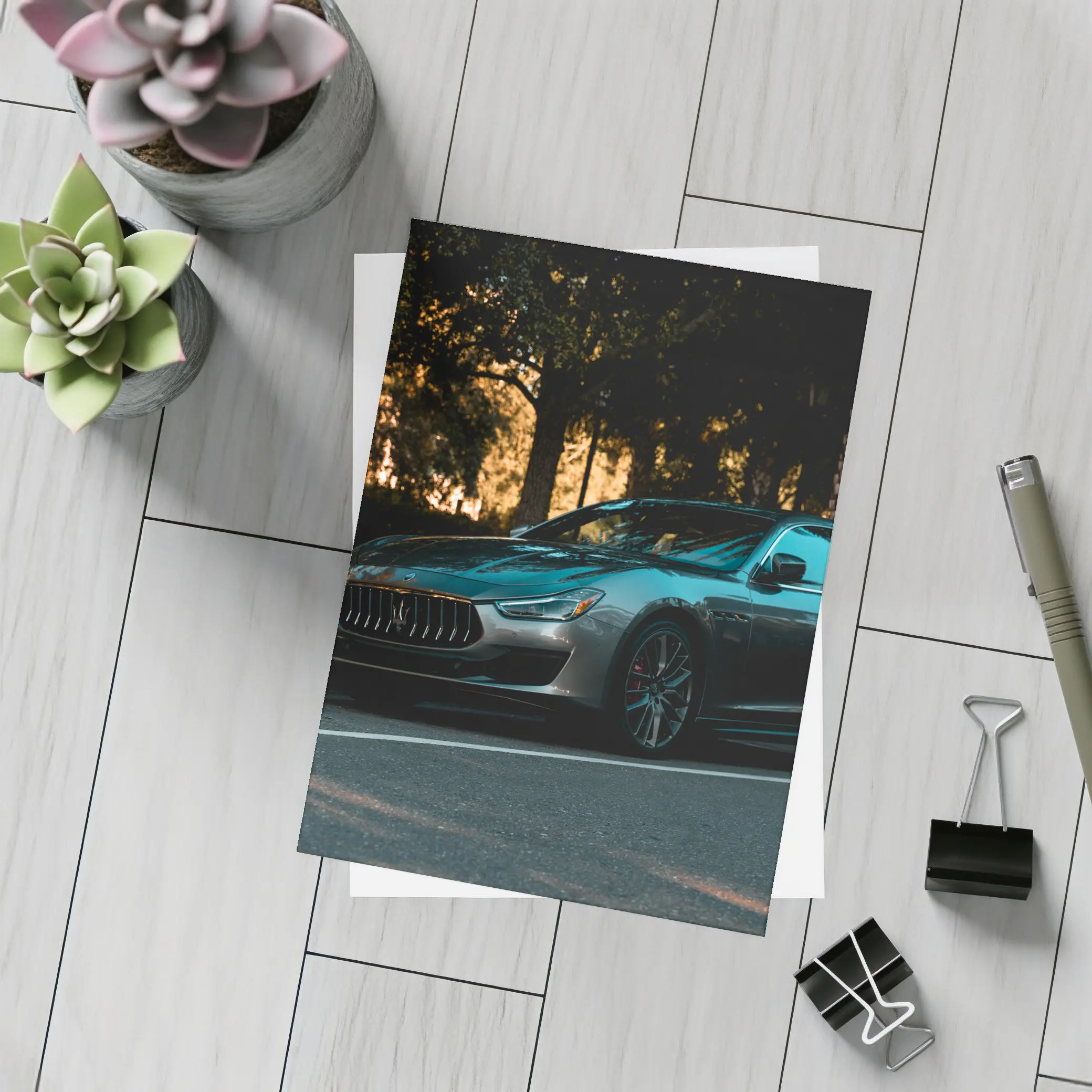 Maserati Ghibli Parked Under Evening Trees – Postcards