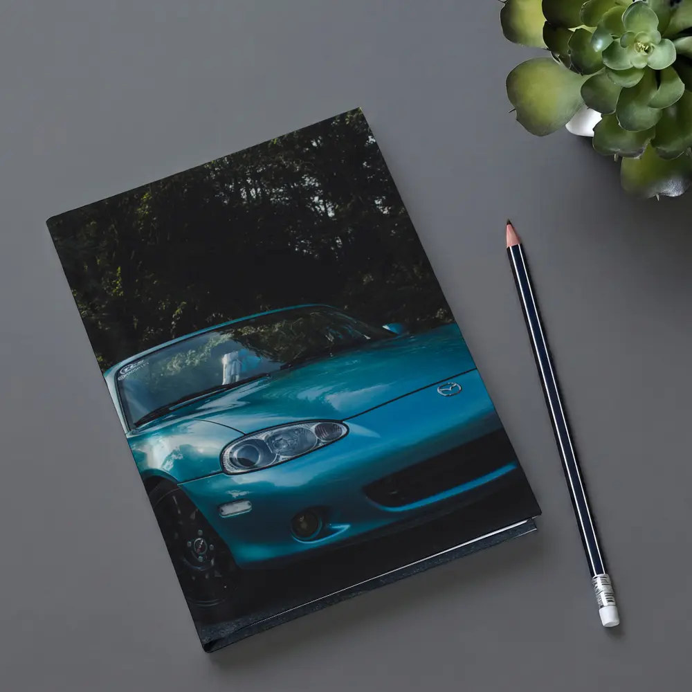 Mazda MX-5 Teal Roadster Forest Background – Notebooks