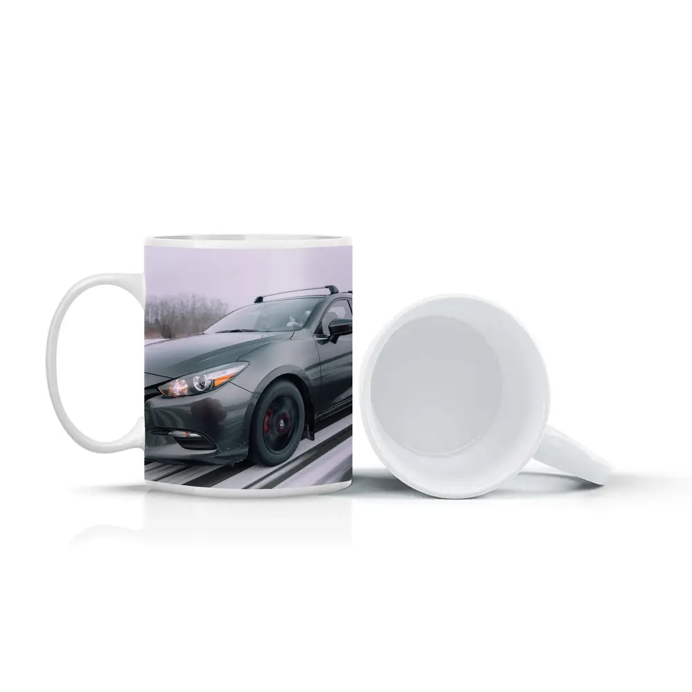 Mazda 3 Hatchback Racing Through Winter Snow – Mugs