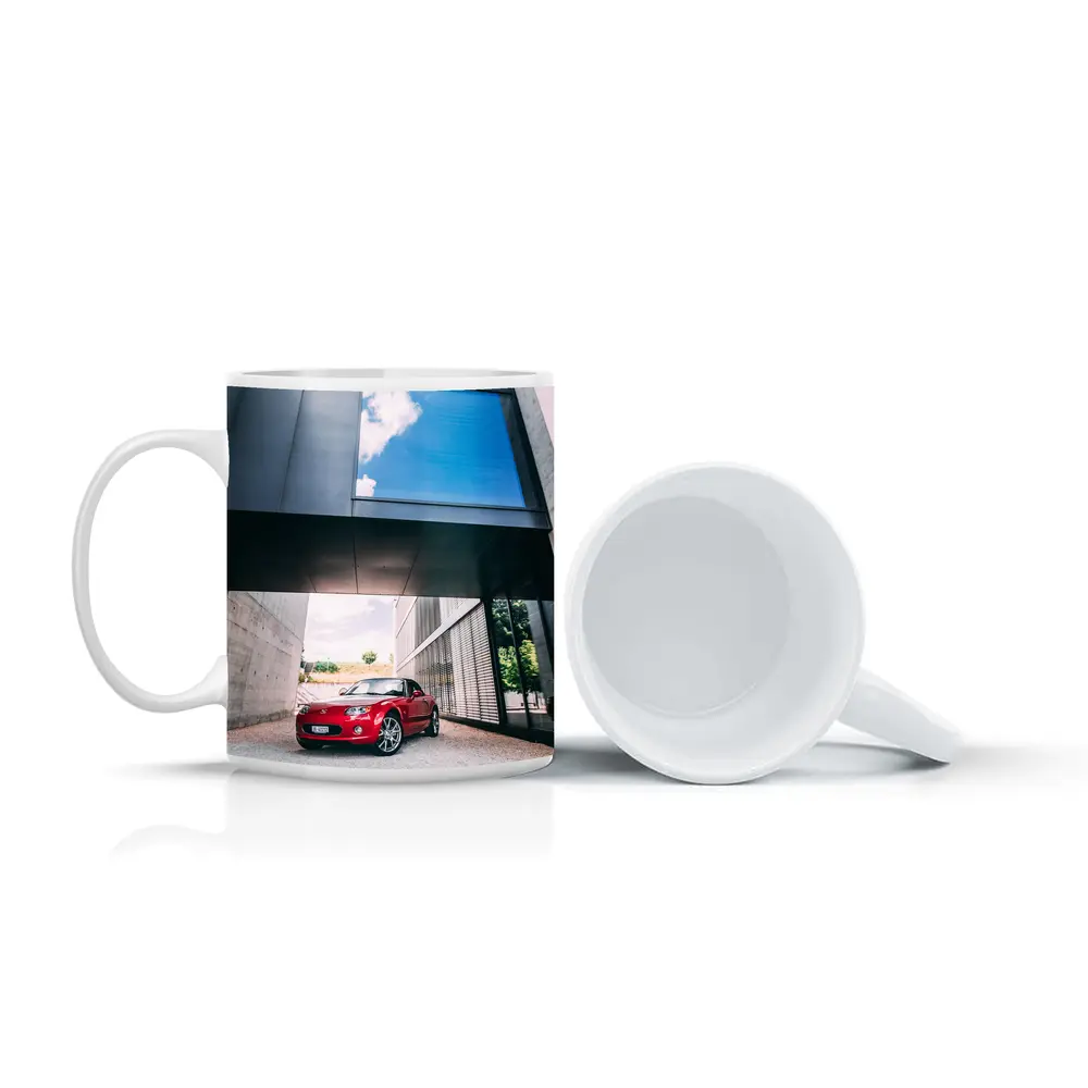 Red Mazda MX5 Parked Under Modern Architecture – Mugs