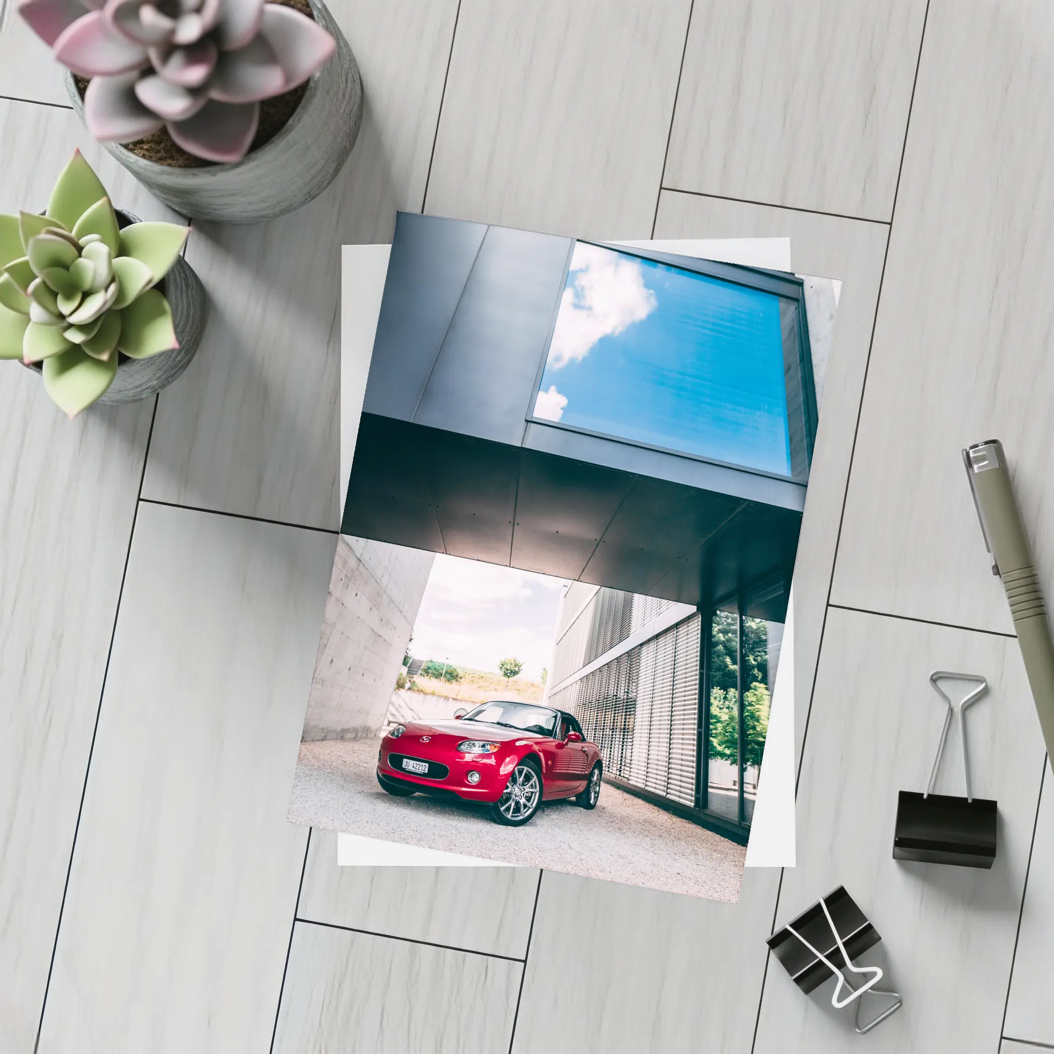 Red Mazda MX5 Parked Under Modern Architecture – Postcards