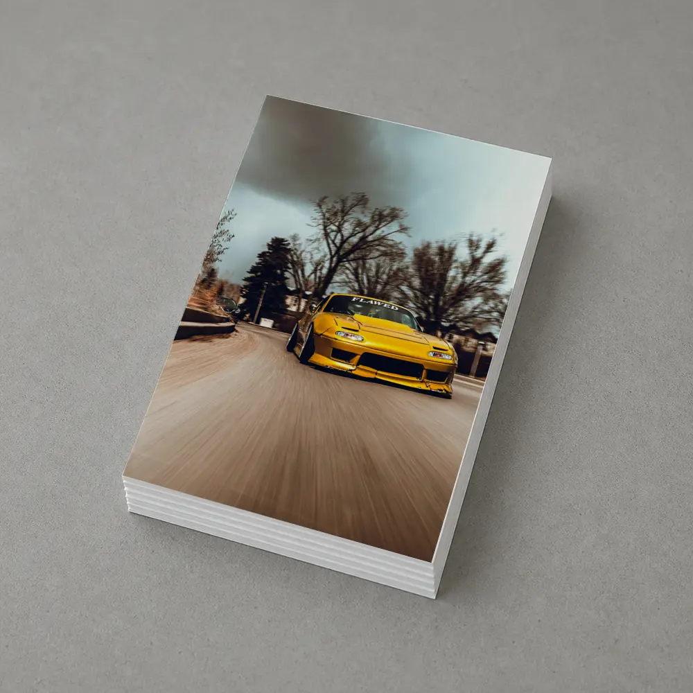 Yellow Mazda RX-7 Racing Through City Street – Postcards