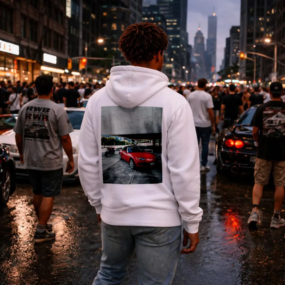 Red Mazda MX5 Parked Near Concrete Structure – Hoodies