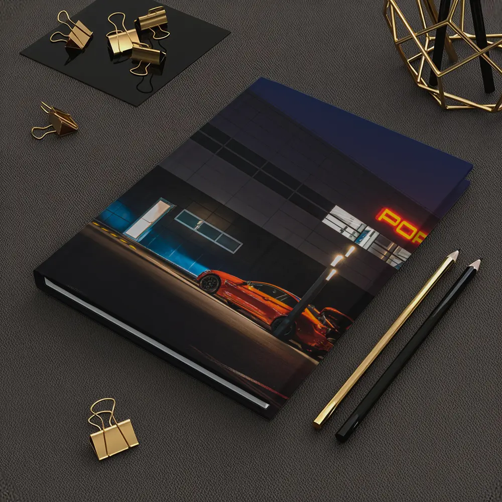Porsche Dealership Glowing Sign Night Scene – Notebooks