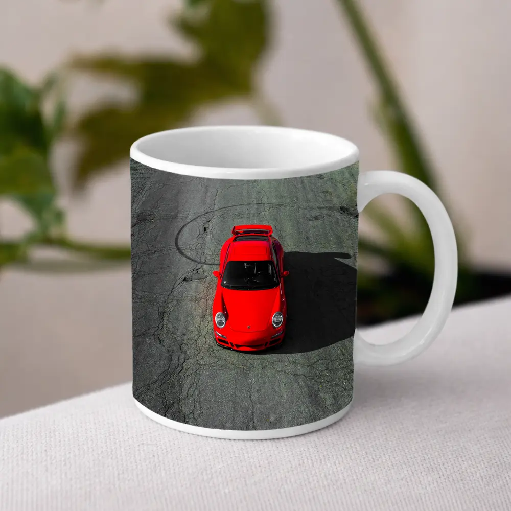Red Porsche 911 Aerial View Cracked Asphalt – Mugs