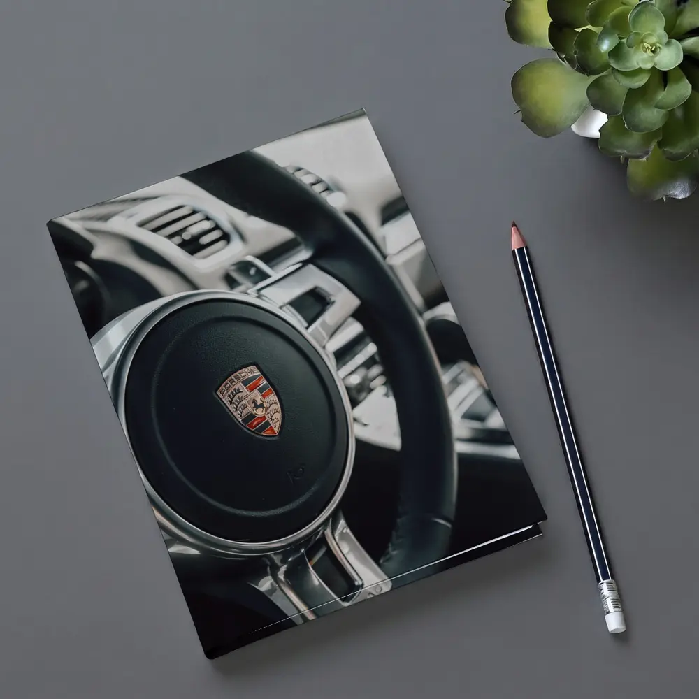 Porsche Steering Wheel Interior Dashboard Close Up – Notebooks