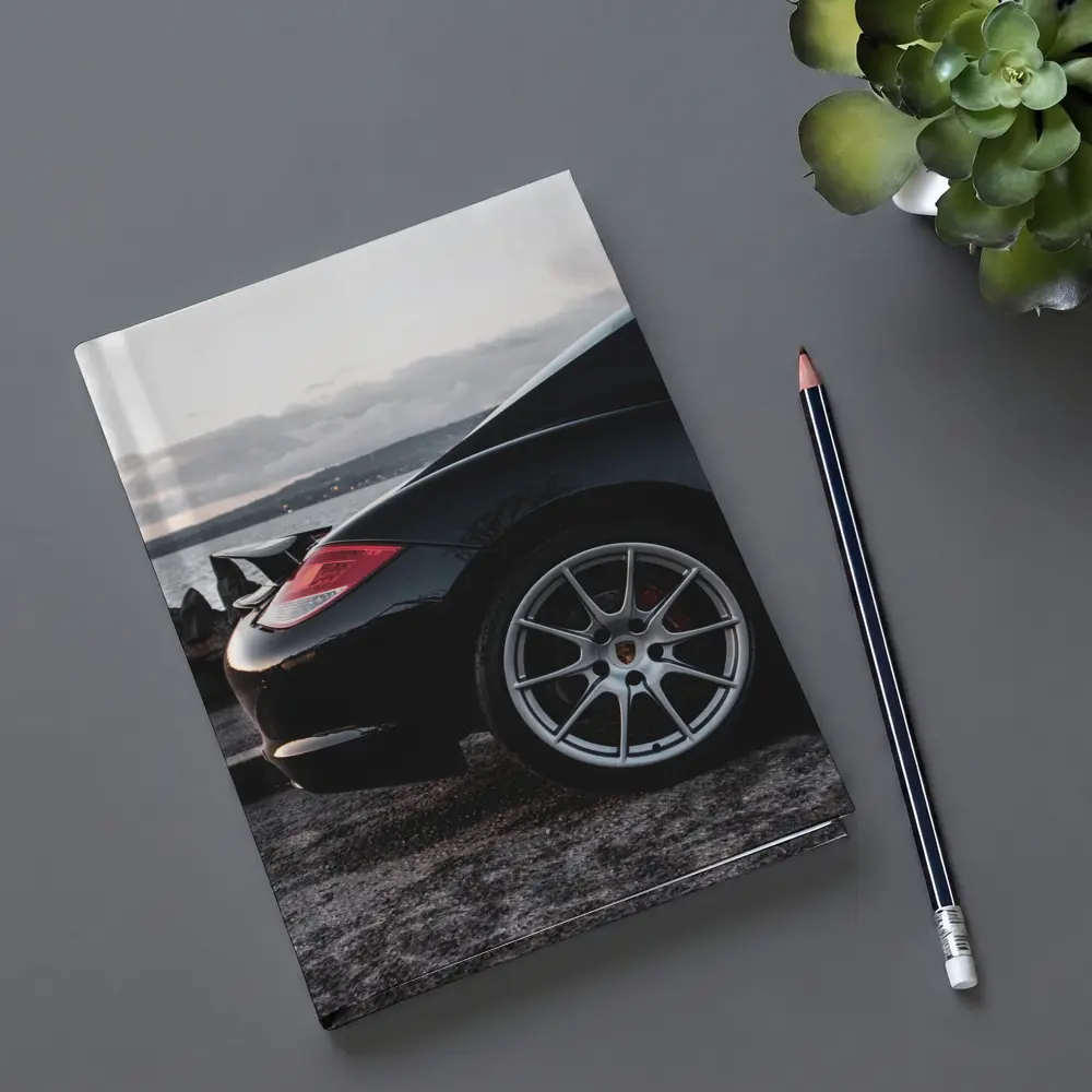 Black Porsche Cayman By Coastal Waterfront – Notebooks