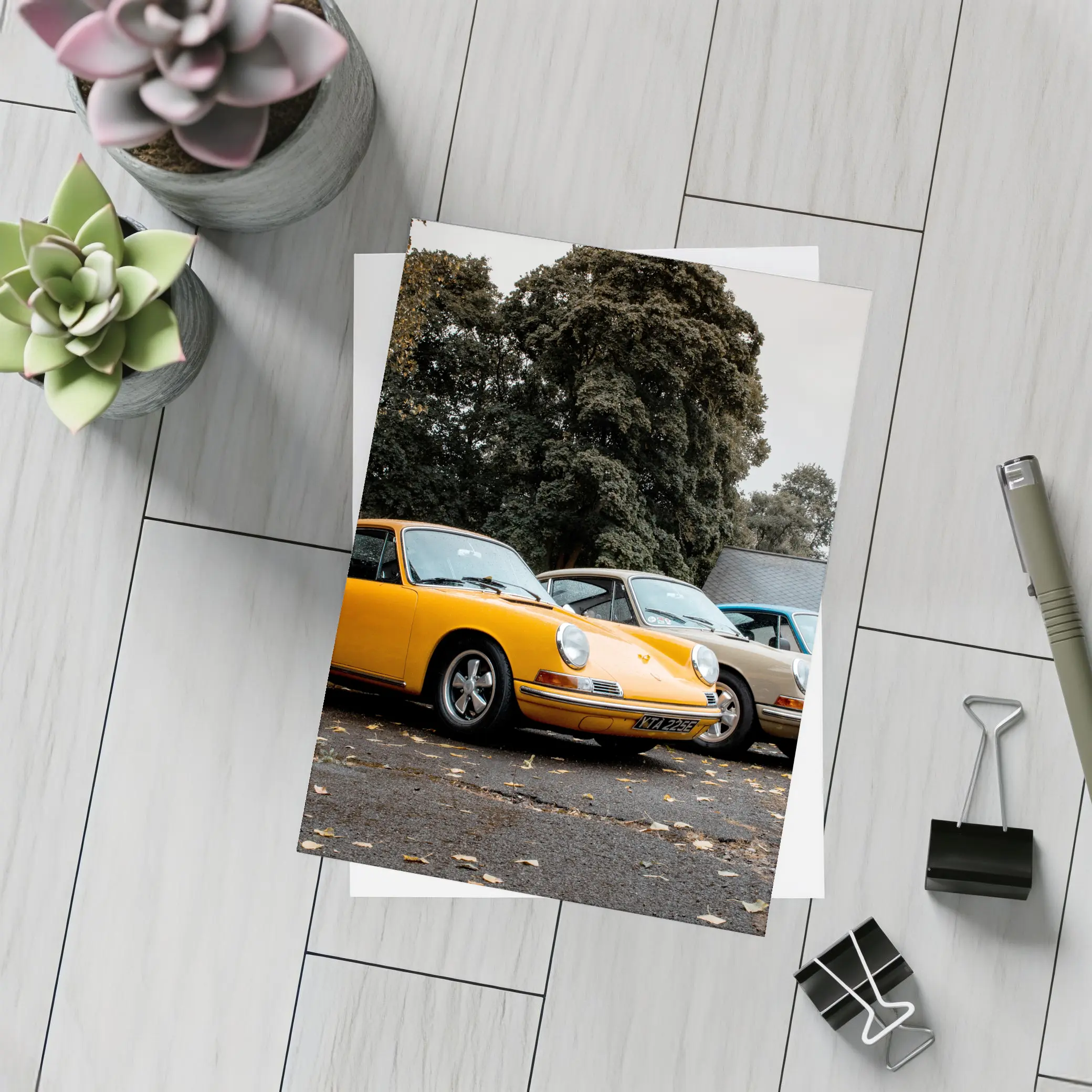 Classic Porsche 911 Trio Parked Outdoors – Postcards
