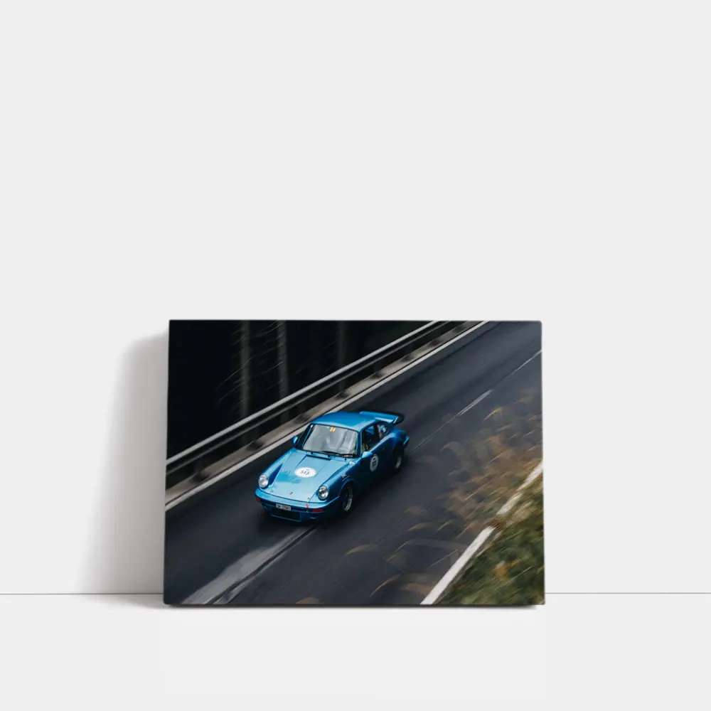 Blue Porsche 911 Racing on Mountain Road – Wall Art