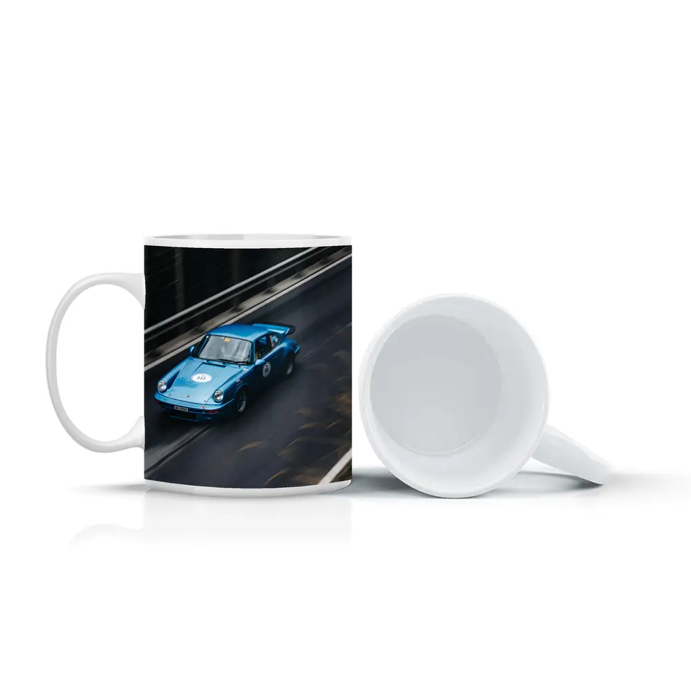 Blue Porsche 911 Racing on Mountain Road – Mugs