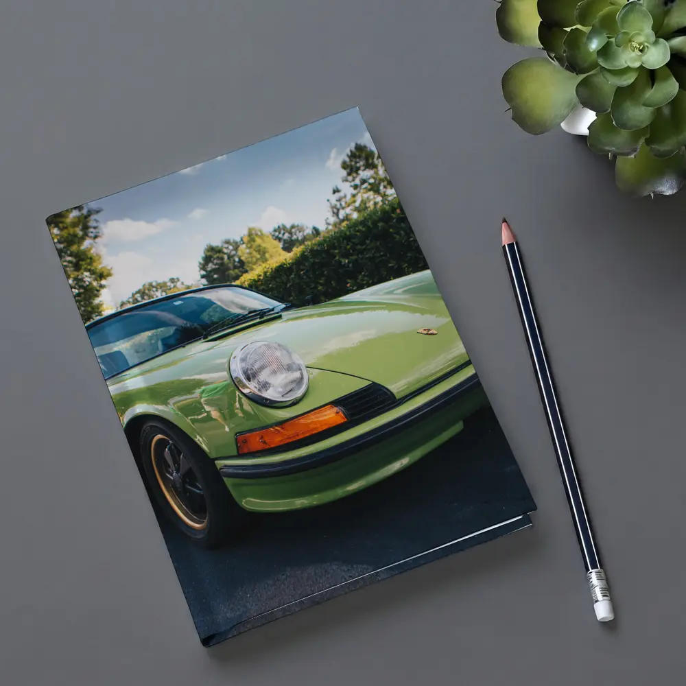 Porsche 911 Classic Green Car Parking Lot – Notebooks