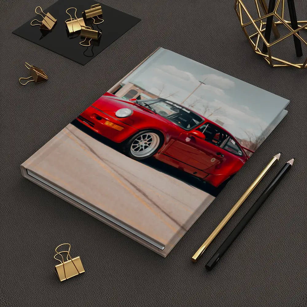 Red Porsche 911 Parked Open Lot – Notebooks