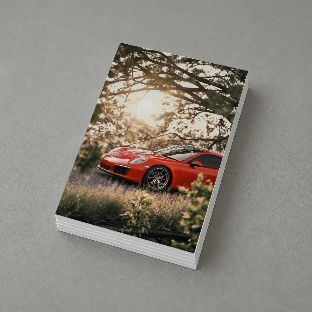 Red Porsche 911 Parked Under Golden Trees – Postcards