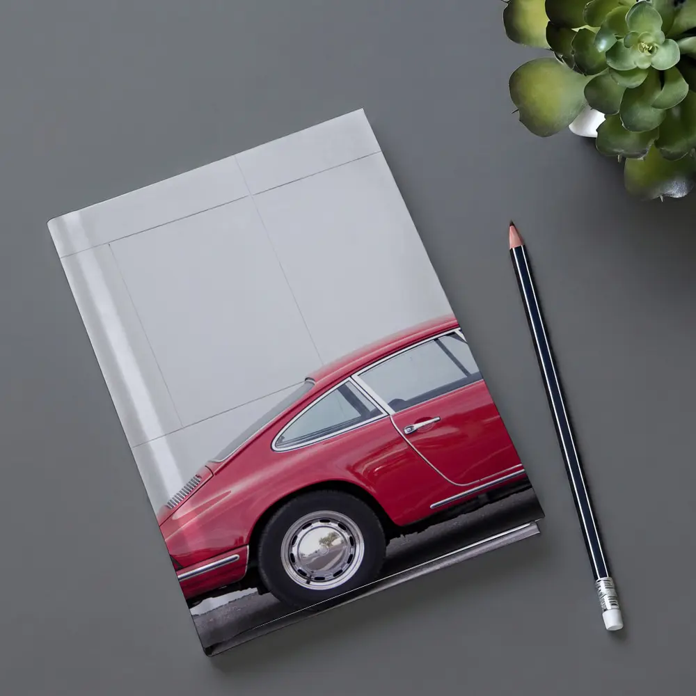 Classic Red Porsche 911 Against White Wall – Notebooks