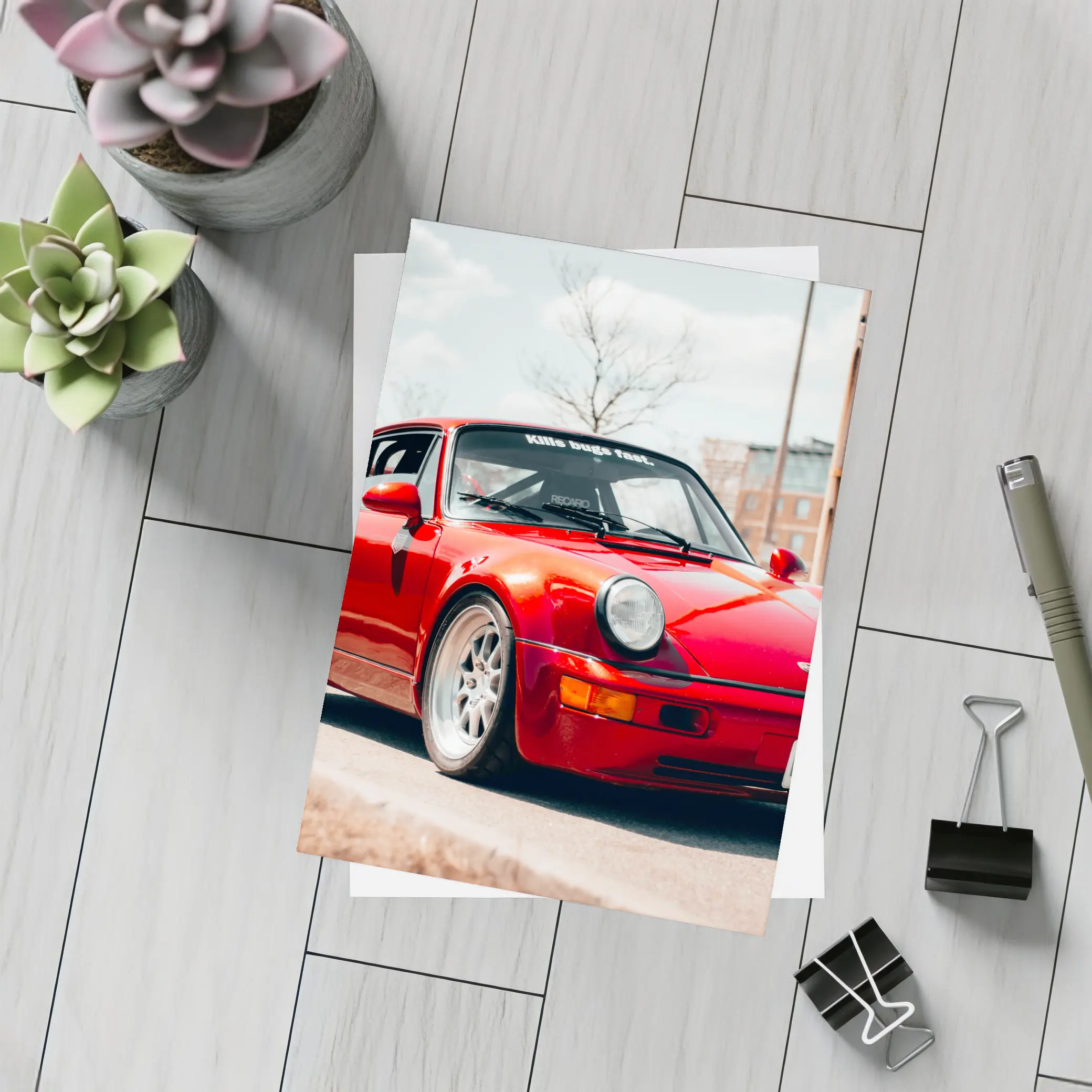 Red Porsche 911 Parked on Urban Street – Postcards