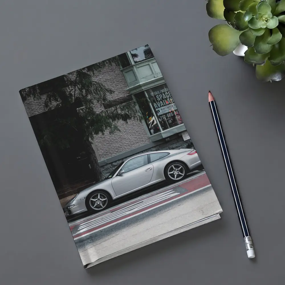 Silver Porsche 911 Parked City Street – Notebooks