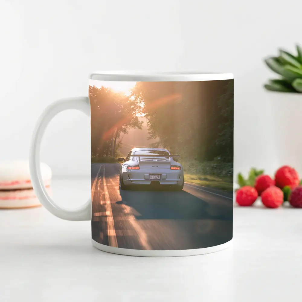 Porsche GT3 Driving Sunlit Country Road – Mugs